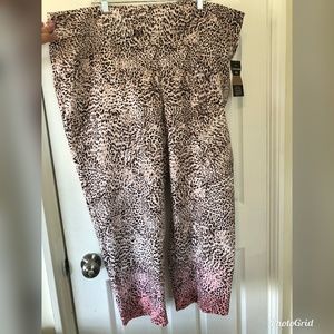 Beige, pink, and black animal print pants
